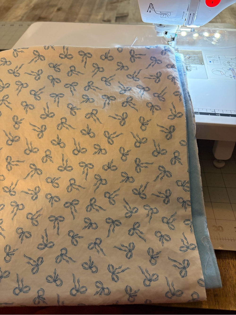 Soft Blue Bow Print baby swaddle blanket home made.
